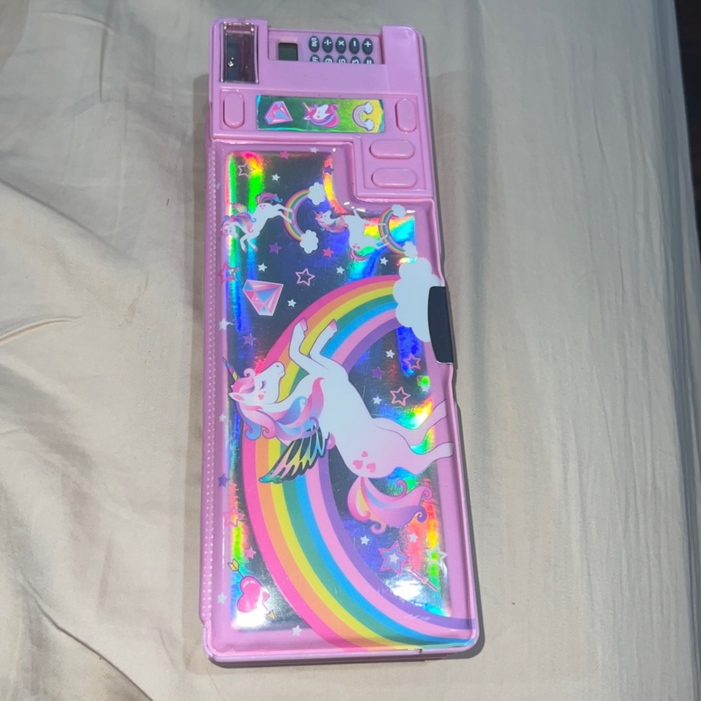 Unicorn unique pencil holder gently used . So many functions.